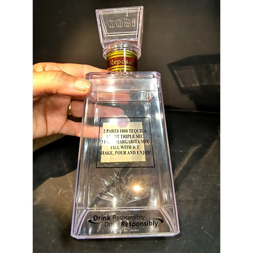 1763.  Empty Plastic Point of Sale Display Bottle 1800 Tequila Reposado